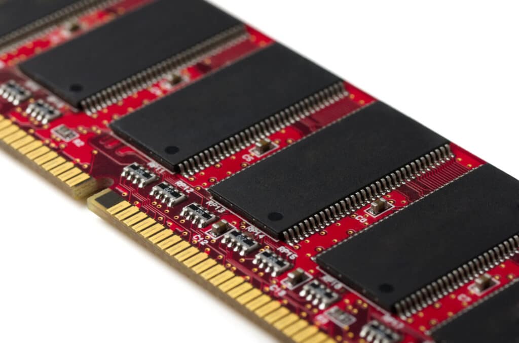 Close-up of computer RAM module on white